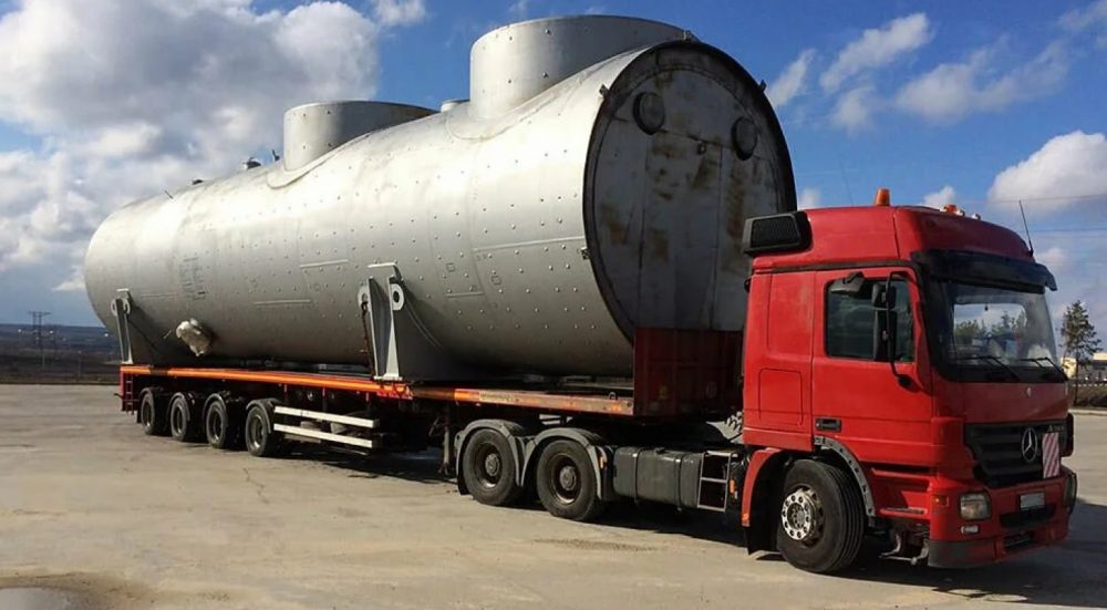 Перевозка негабаритных емкостей и цистерн на трале стоимость услуг и где заказать - Урус-Мартан